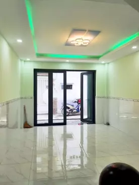 Nhà 5 tầng BTCT, ô tô 7 chỗ đổ cửa, gần trường Đại học Bách khoa TP.HCM-anh-1