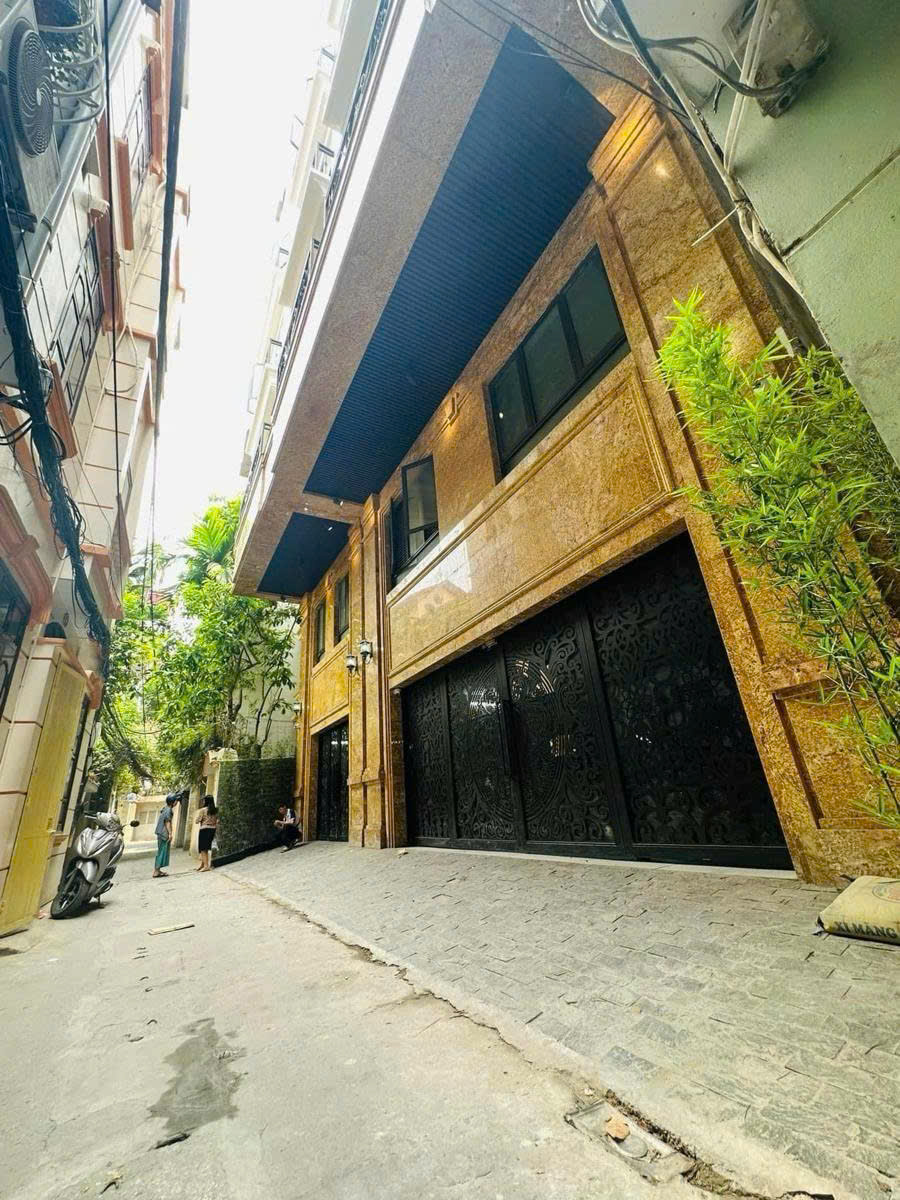 Toà nhà dòng tiền 7 tầng quận Thanh Xuân mặt ngõ thông,ôt vào nhà, ôt tải đỗ cửa, sổ đỏ vuông vức,-anh-1